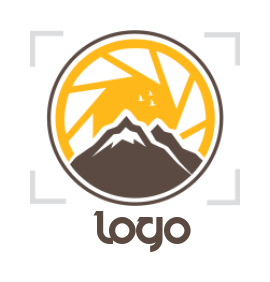 photography logo camera lens behind the mountain