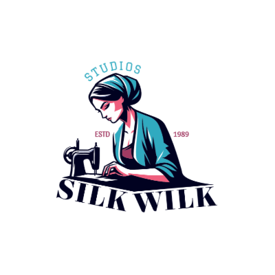 woman sewing fabric on vintage machine