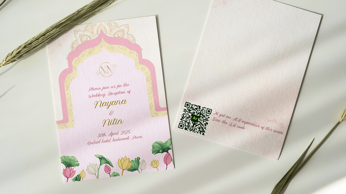 A blush pink wedding invite featuring a black and white QR code A blush pink wedding invite featuring a black and white QR code