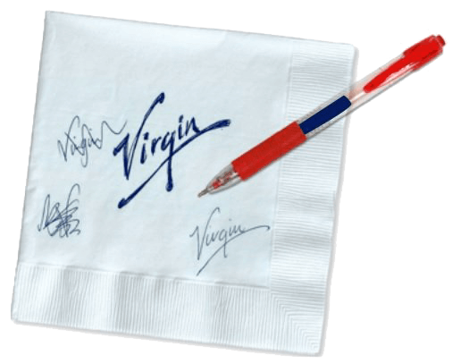A napkin with a pen and signature, representing a signed document or agreement.