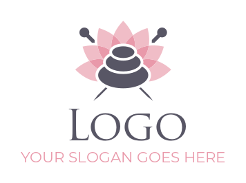 spa logo stones with lotus and needles at back