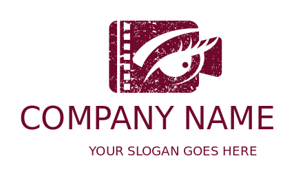 entertainment logo eye in film strip of camera