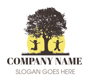 pre-school logo of tree silhouette with boy and girl