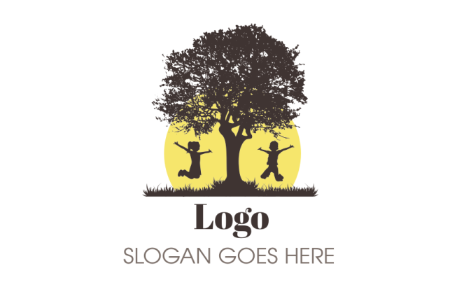 pre-school logo of tree silhouette with boy and girl