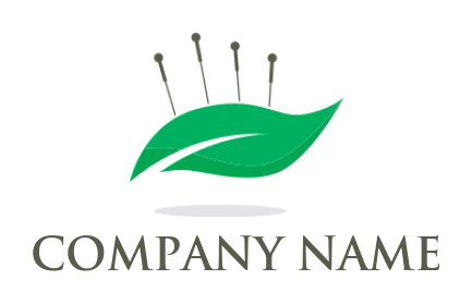 logo icon of acupuncture needles and leaf