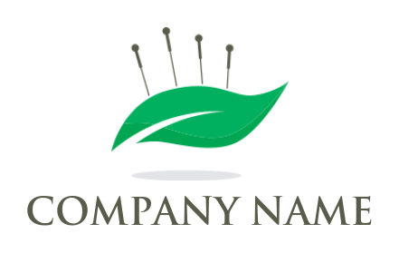 logo icon of acupuncture needles and leaf