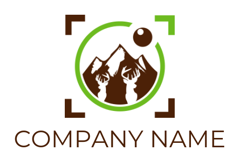 photography logo mountains behind deer