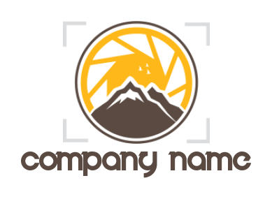 photography logo camera lens behind the mountain
