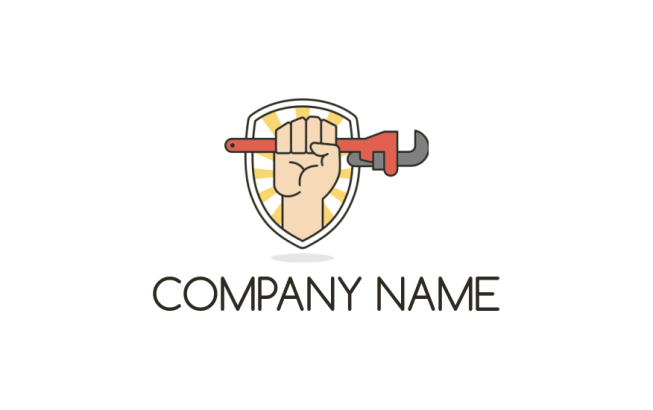 handyman logo hand holding plumbing wrench