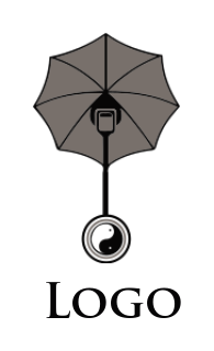 yin yang symbol in camera lens hanging from umbrella 