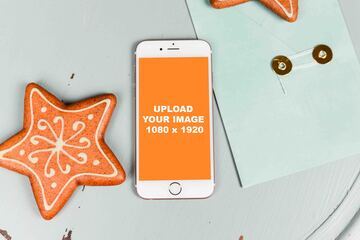 Mockup builder feature gold iPhone with Christmas star